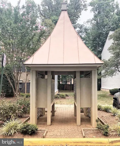a view of multiple houses with a yard