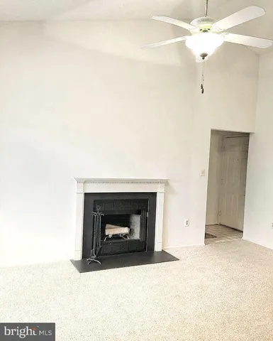 a living room with a fireplace