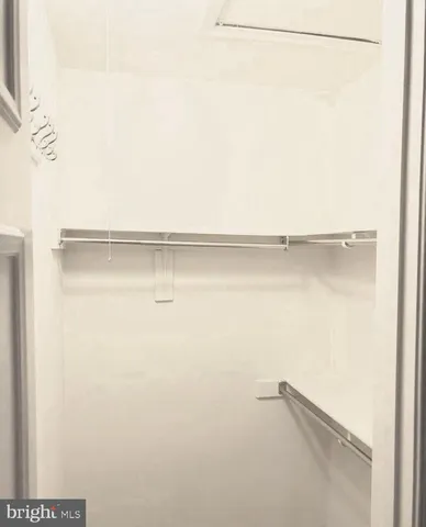 a view of a room with racks on the wall