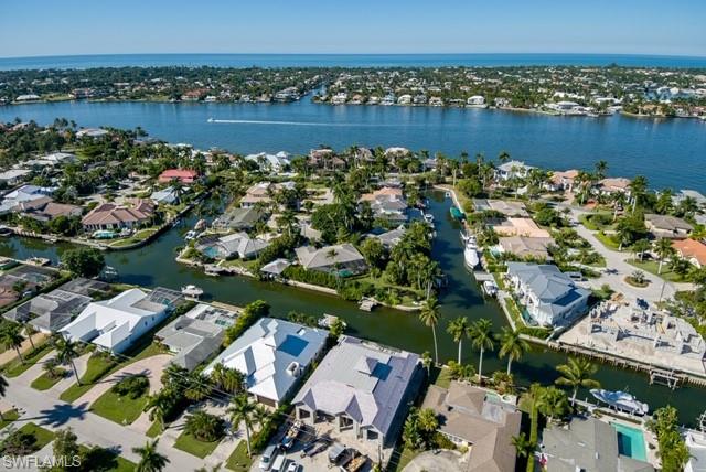 2130 Tarpon Road Naples, FL 34102 - Photo 11 of 12 an aerial view of a city