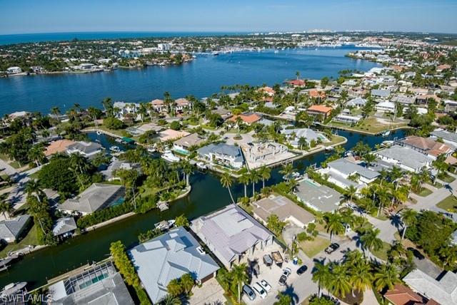 2130 Tarpon Road Naples, FL 34102 - Photo 12 of 12 an aerial view of a residential houses with outdoor space and trees all around