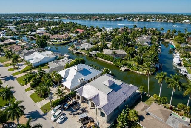 2130 Tarpon Road Naples, FL 34102 - Photo 6 of 12 an aerial view of a residential houses with outdoor space and trees