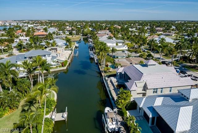 2130 Tarpon Road Naples, FL 34102 - Photo 9 of 12 an aerial view of a house with a yard