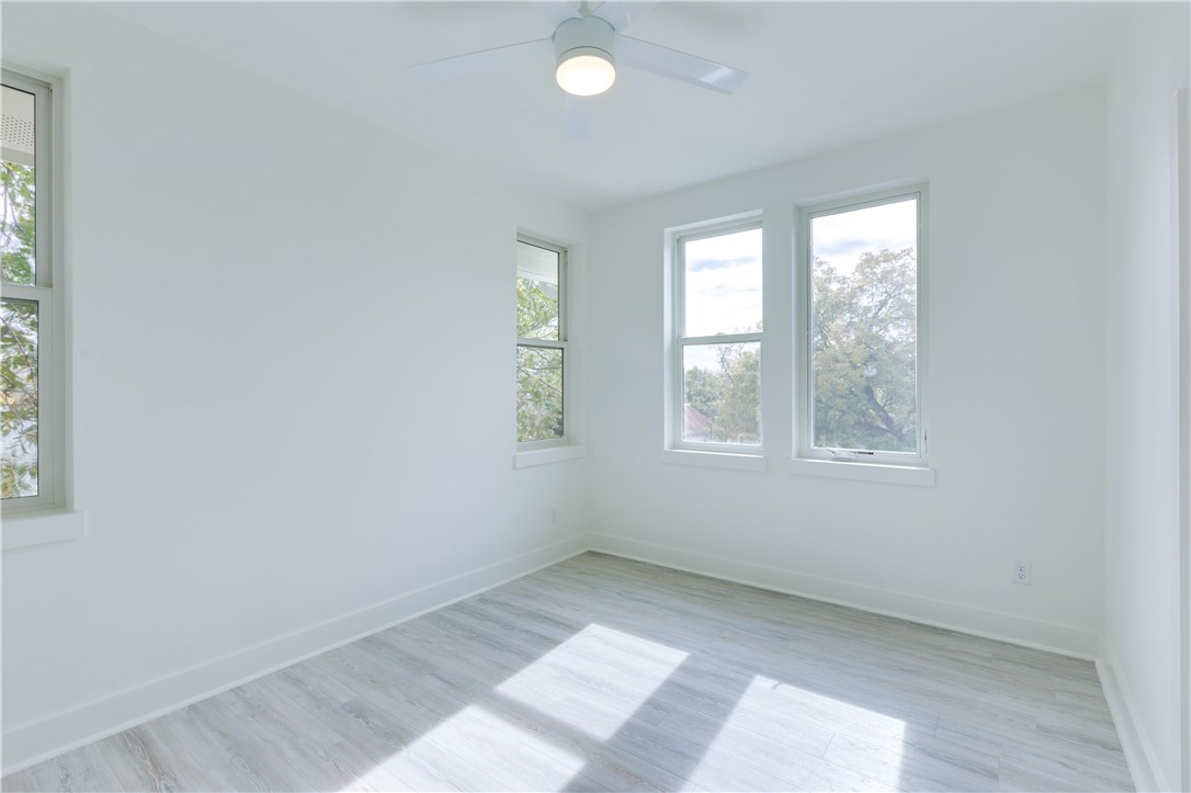 1906 East 17th Street, Unit 1 Austin, TX 78702 - Photo 27 of 33 an empty room with windows