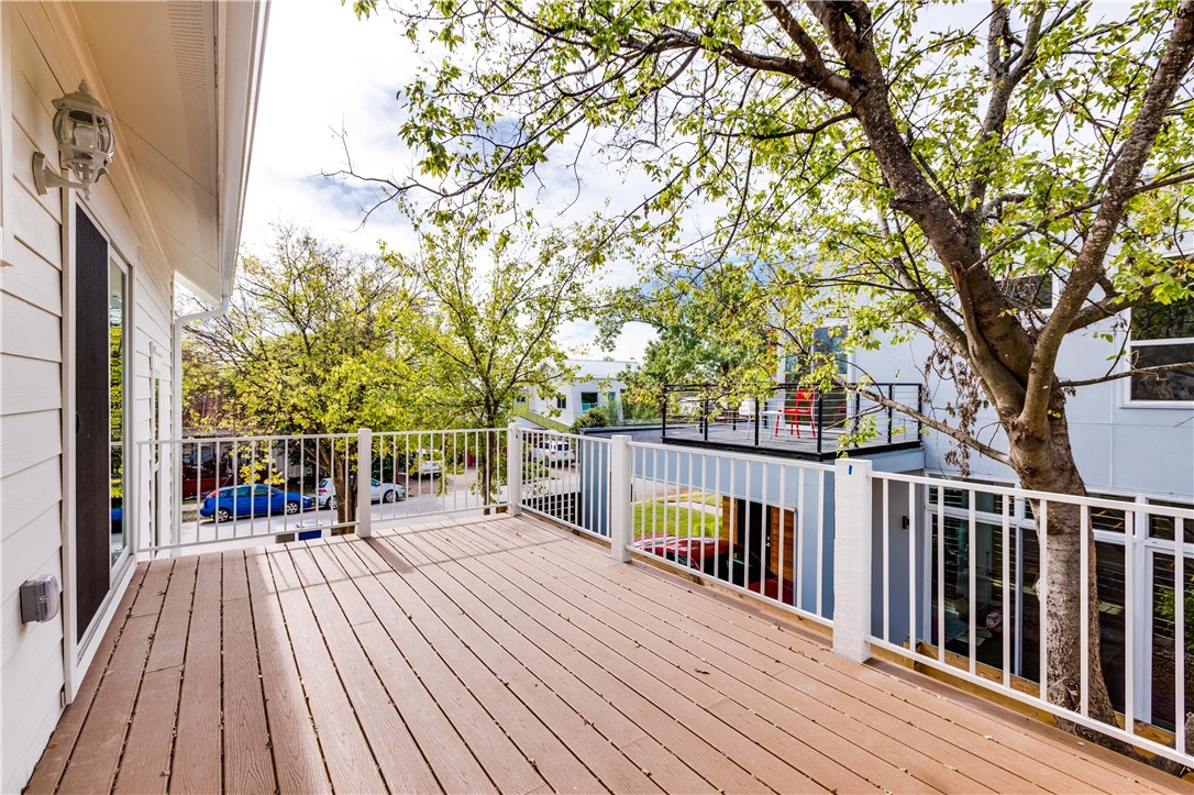1906 East 17th Street, Unit 1 Austin, TX 78702 - Photo 9 of 33 a balcony with wooden floor and fence