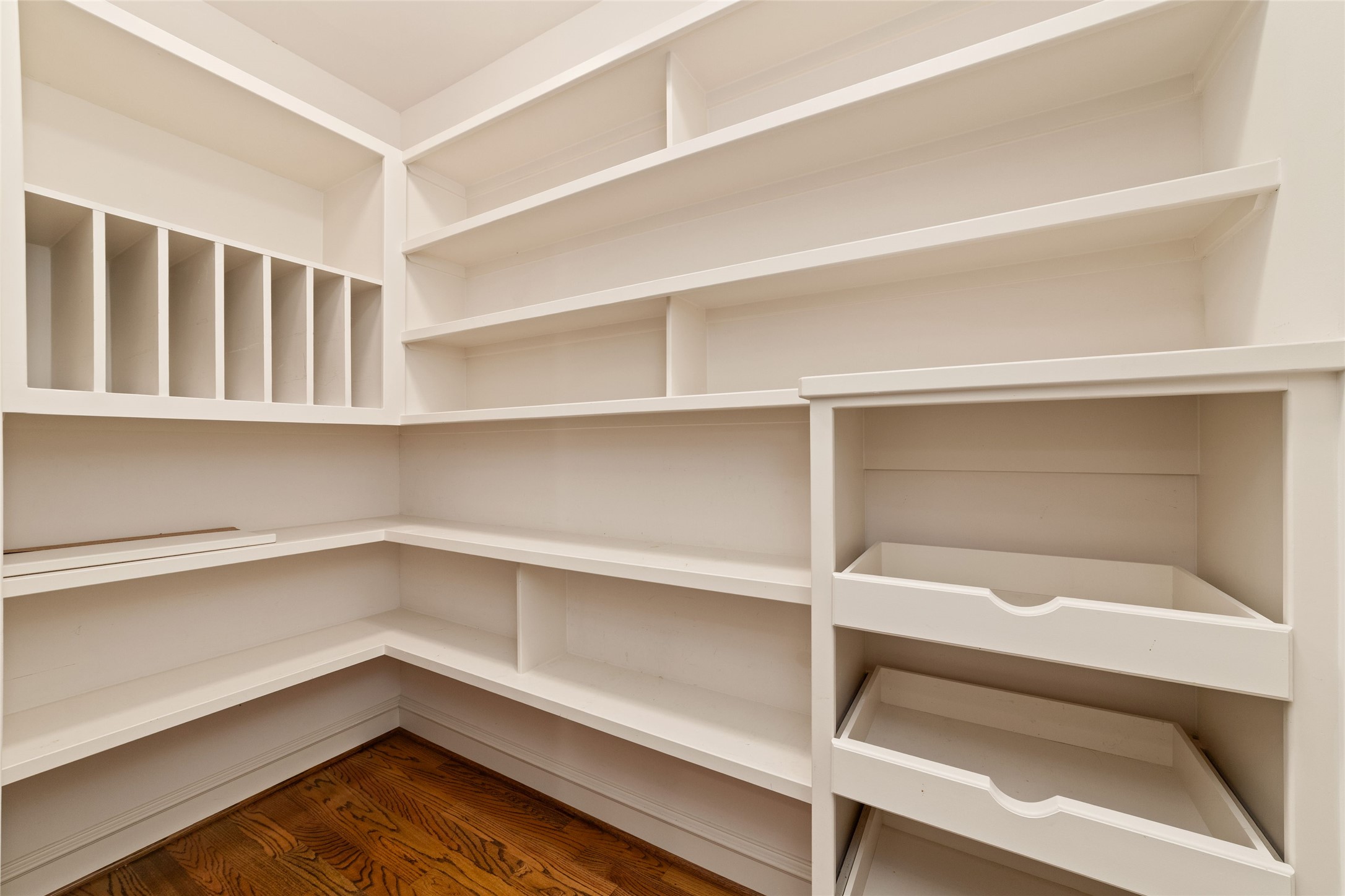 4102 Gramercy Street Houston, TX 77025 - Photo 16 of 35 a storage room with cabinets