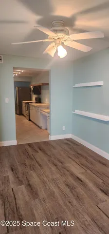 a kitchen with a cabinets and window