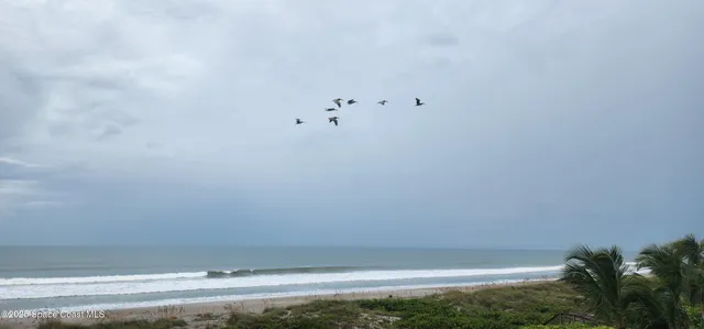 a view of a terrace with a yard