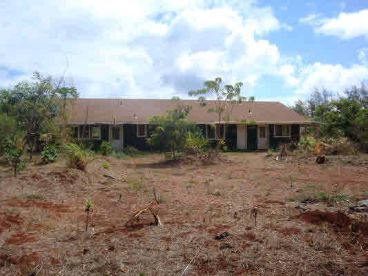 6020 Koolau Road, Unit 56 Kilauea, HI 96754 - Photo 2 of 9 a view of a house with a yard