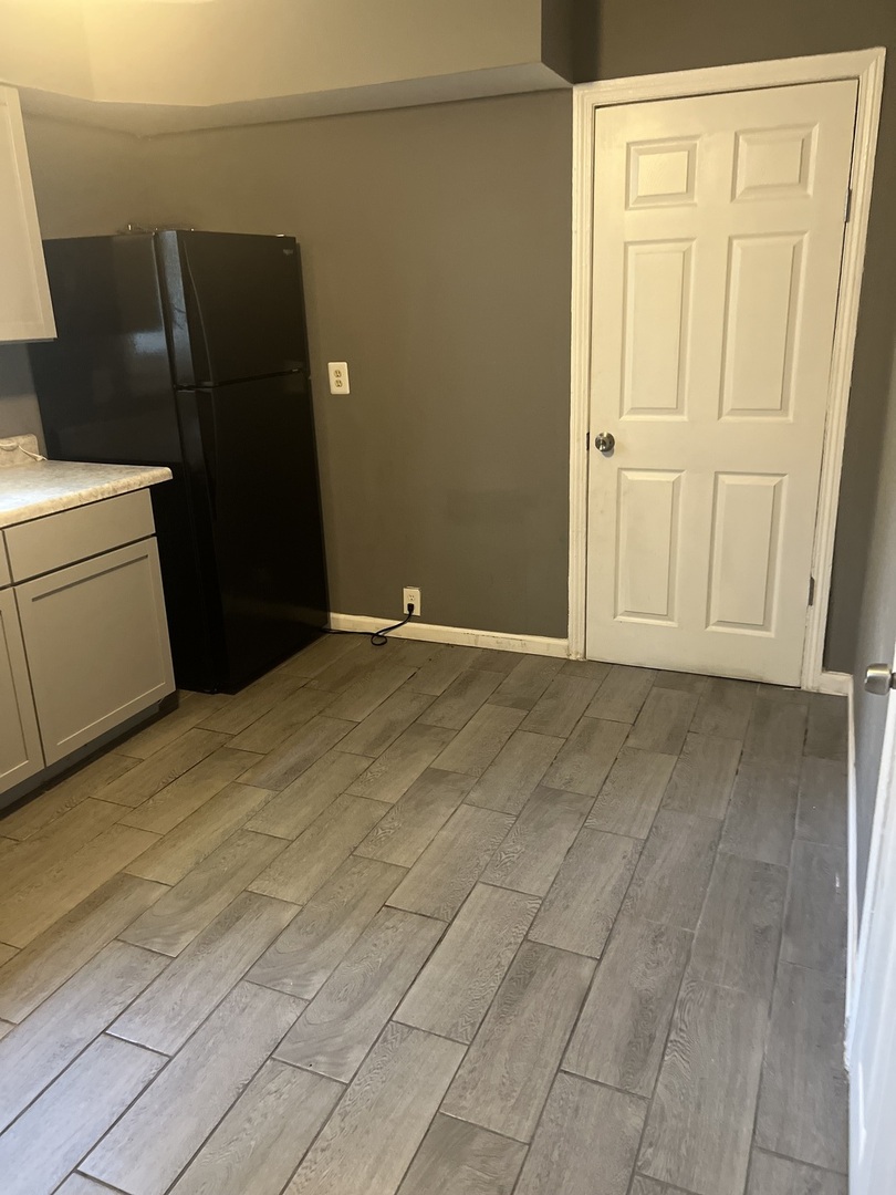 12124 South Normal Avenue Chicago, IL 60628 - Photo 12 of 36 a view of an empty room