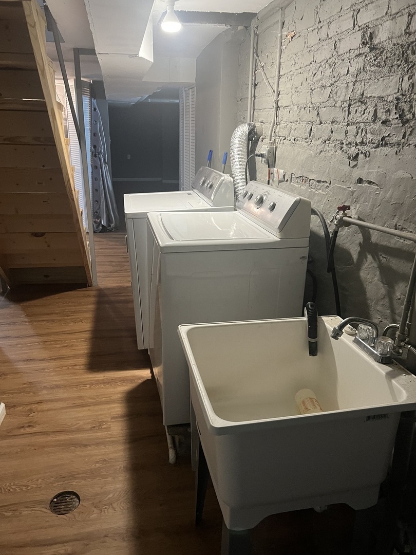 12124 South Normal Avenue Chicago, IL 60628 - Photo 29 of 36 a bathroom with a sink and mirror