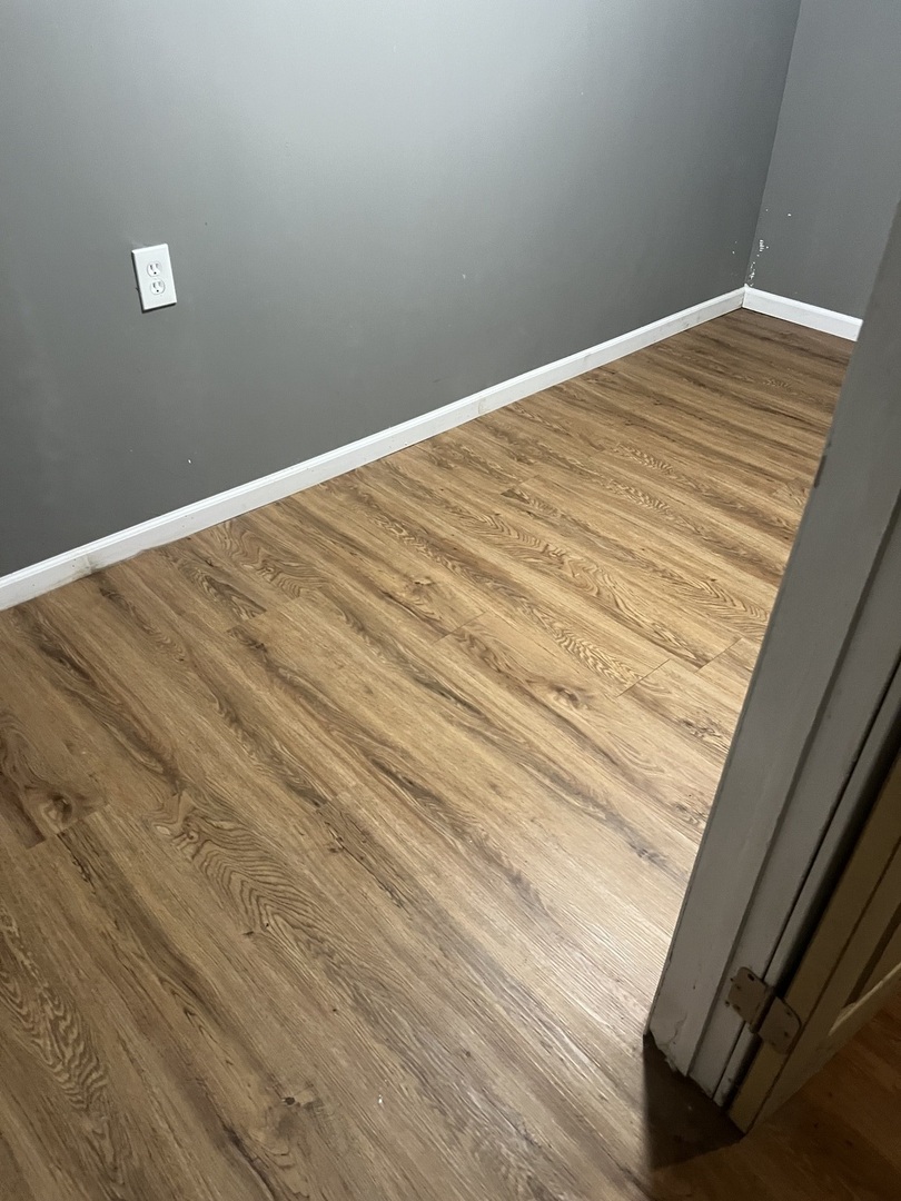 12124 South Normal Avenue Chicago, IL 60628 - Photo 32 of 36 a view of wooden floor