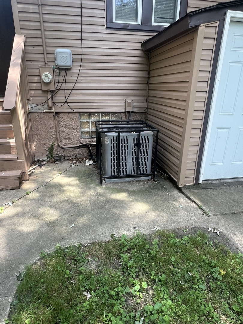 12124 South Normal Avenue Chicago, IL 60628 - Photo 33 of 36 a view of a house with backyard