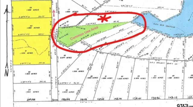 a picture of a book and a white bed