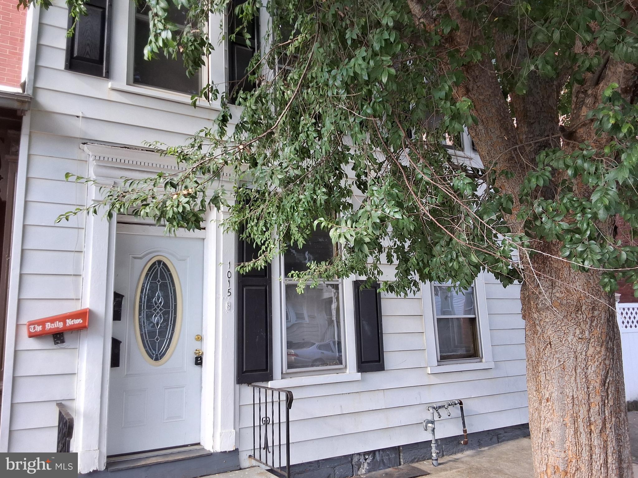 1015 Chestnut Street, Unit 1 Lebanon, PA 17042 - Photo 1 of 20 a view of wooden fence and a tree