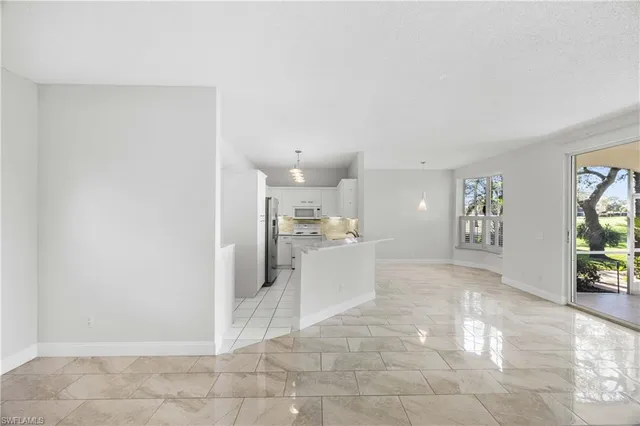 a view of livingroom with workspace