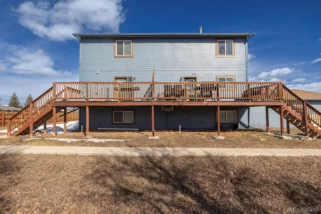 a view of a house with roof deck