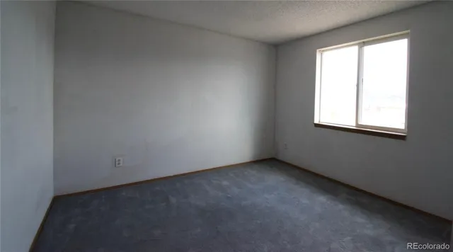 an empty room with a window