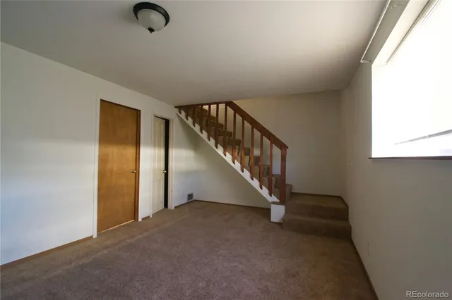 a view of an entryway with staircase