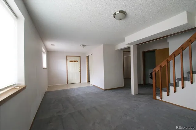 a view of hallway with stairs