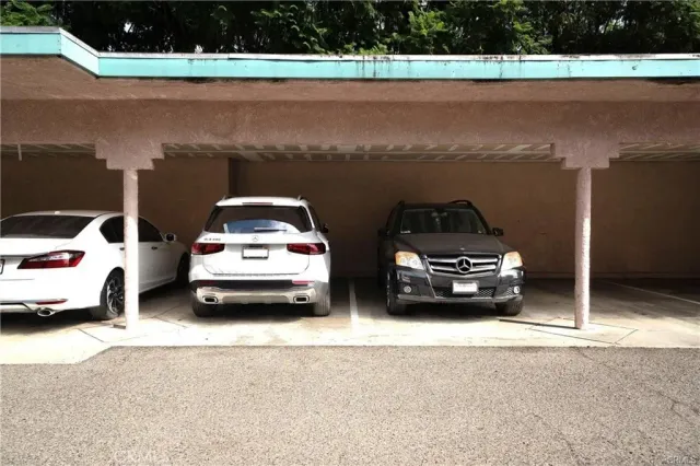 a car parked on the side of a building