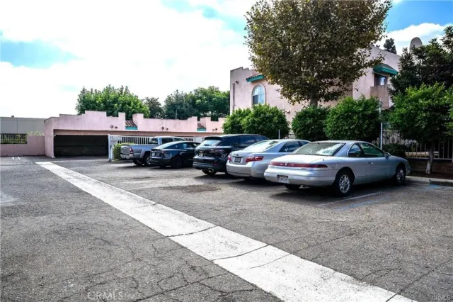 a view of a cars parked in a parking lot