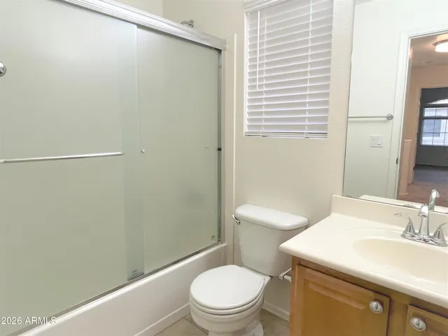 a view of a hallway with two rooms