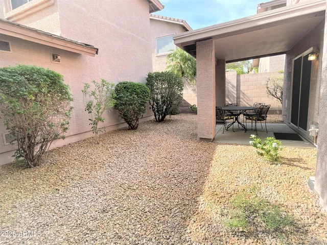 a view of a house with a snow and trees
