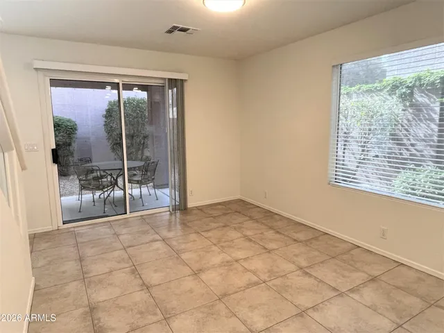 a view of an empty room and window