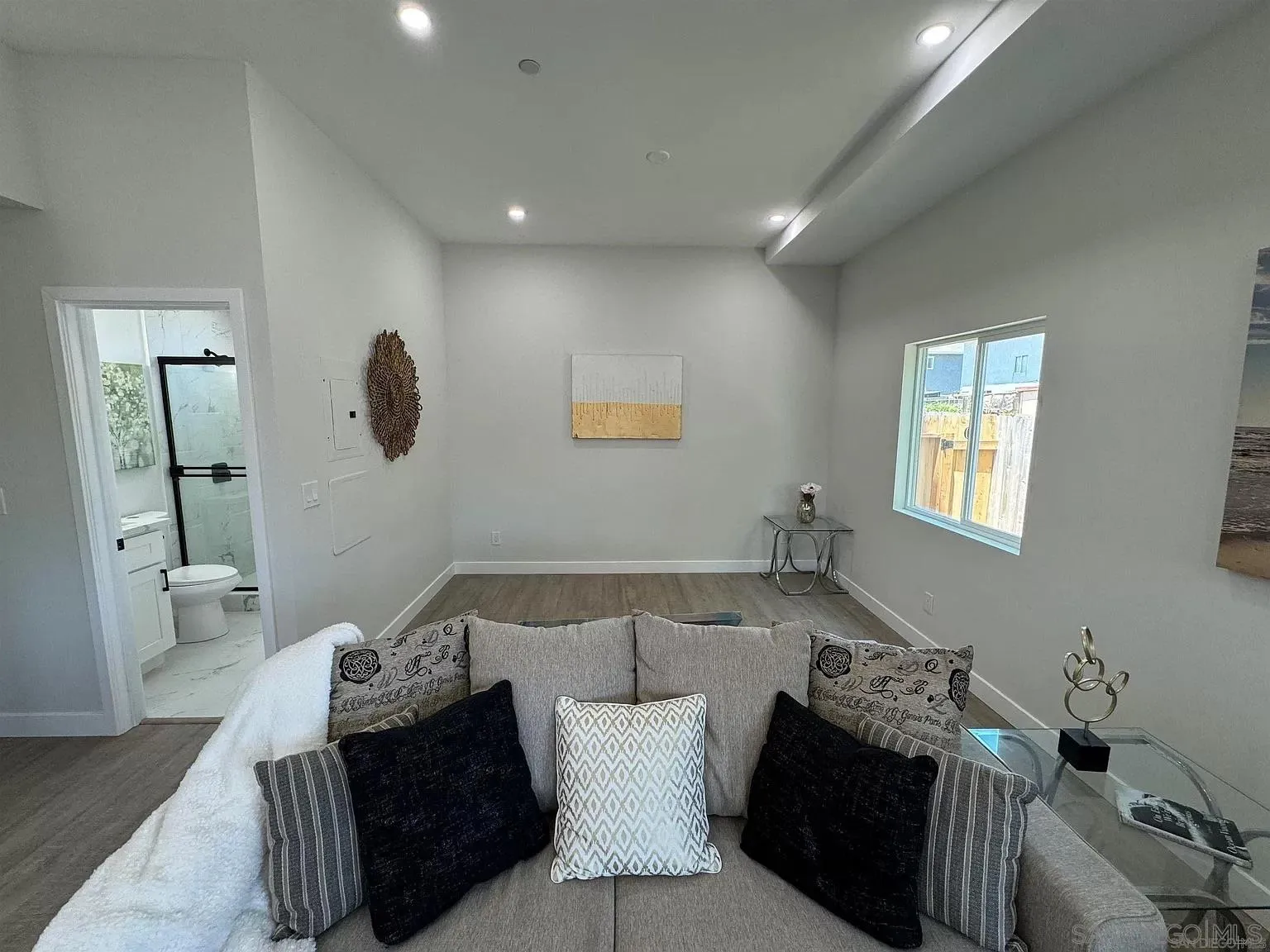1064 11th Street, Unit 2 Imperial Beach, CA 91932 - Photo 3 of 10 a living room with furniture and a potted plant