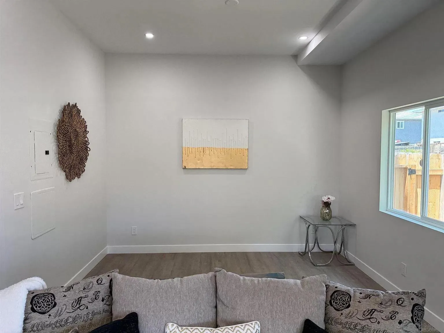 1064 11th Street, Unit 2 Imperial Beach, CA 91932 - Photo 4 of 10 a bedroom with a bed and a window