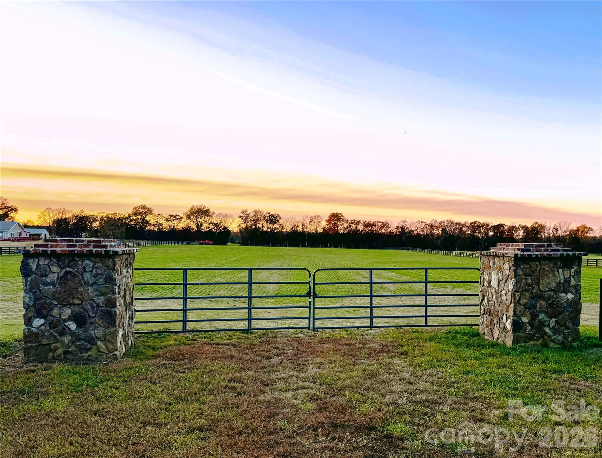 0 Mayhugh Road Chester, SC 29706 - Photo 7 of 9 a view of a garden with a building in the background