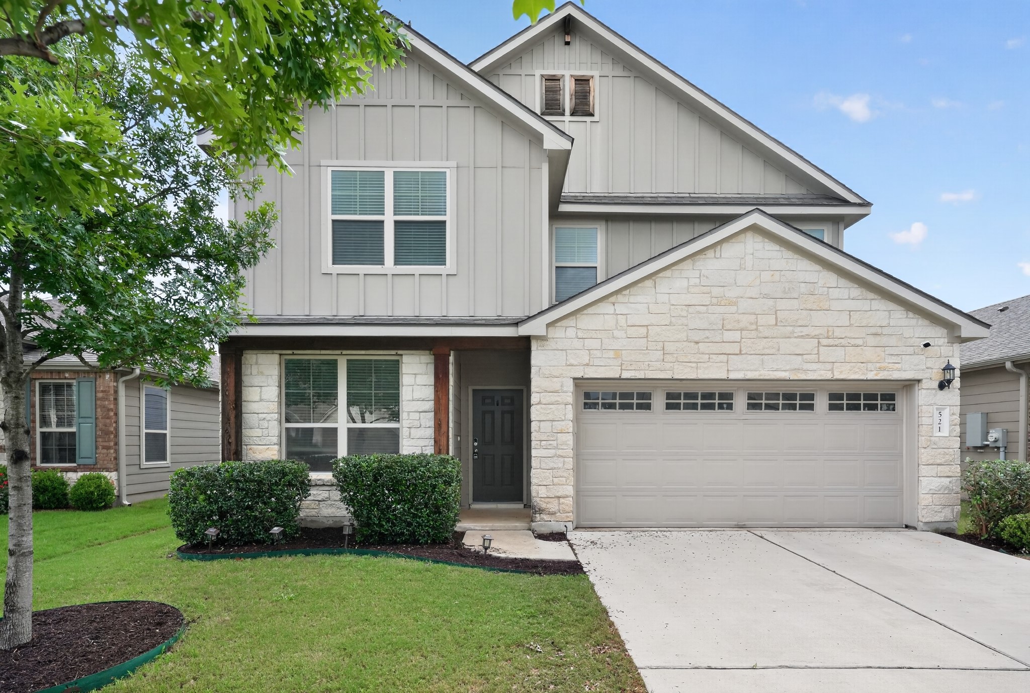 521 Staton Street Georgetown, TX 78626 - Photo 1 of 39 a front view of a house with a yard and garage
