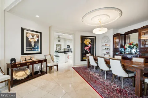 a bedroom with a bed wooden floor and window