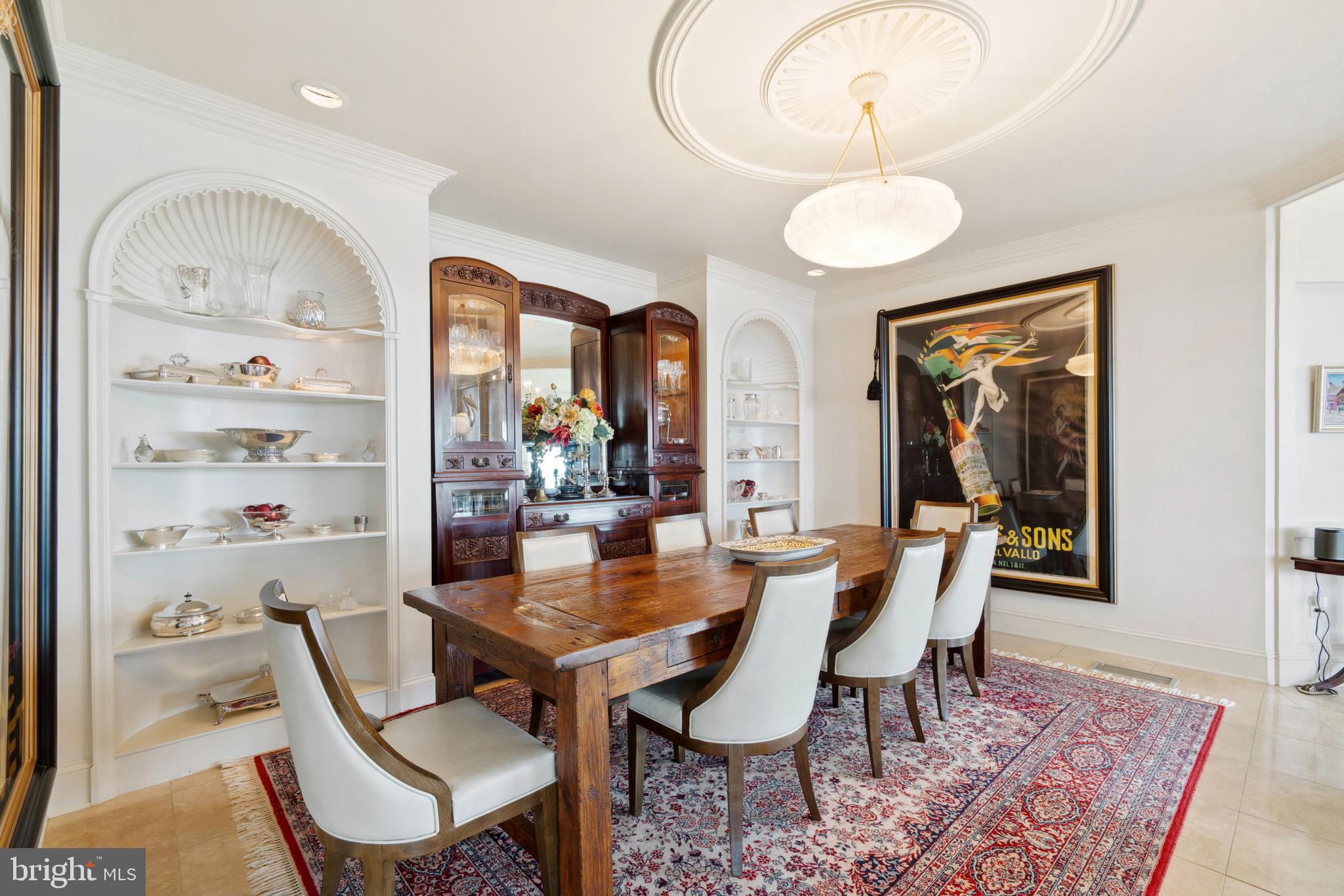 9791 Pintail Place St. Michaels, MD 21663 - Photo 16 of 80 a view of a dining room with furniture window and wooden floor