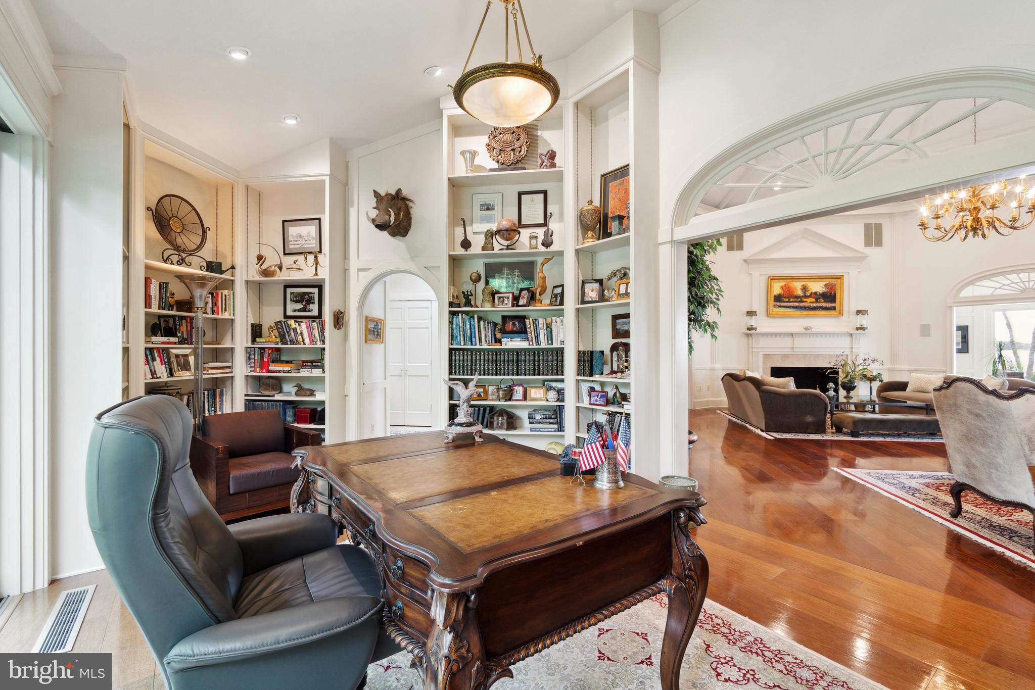 9791 Pintail Place St. Michaels, MD 21663 - Photo 27 of 80 a living room with furniture a rug and a flat screen tv