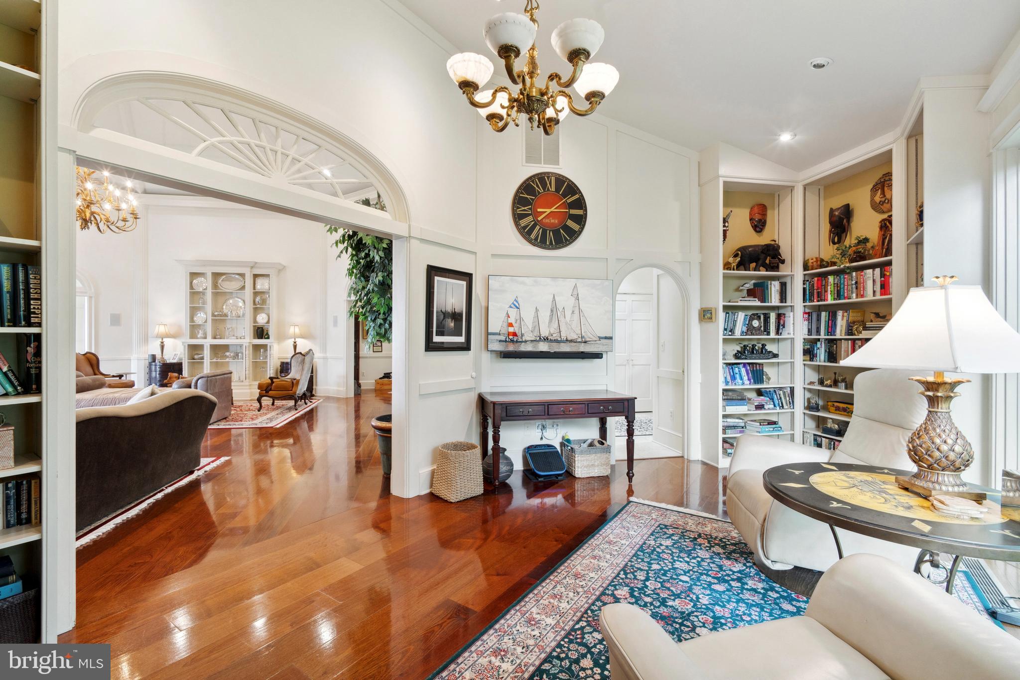 9791 Pintail Place St. Michaels, MD 21663 - Photo 29 of 80 a living room with furniture and a fireplace