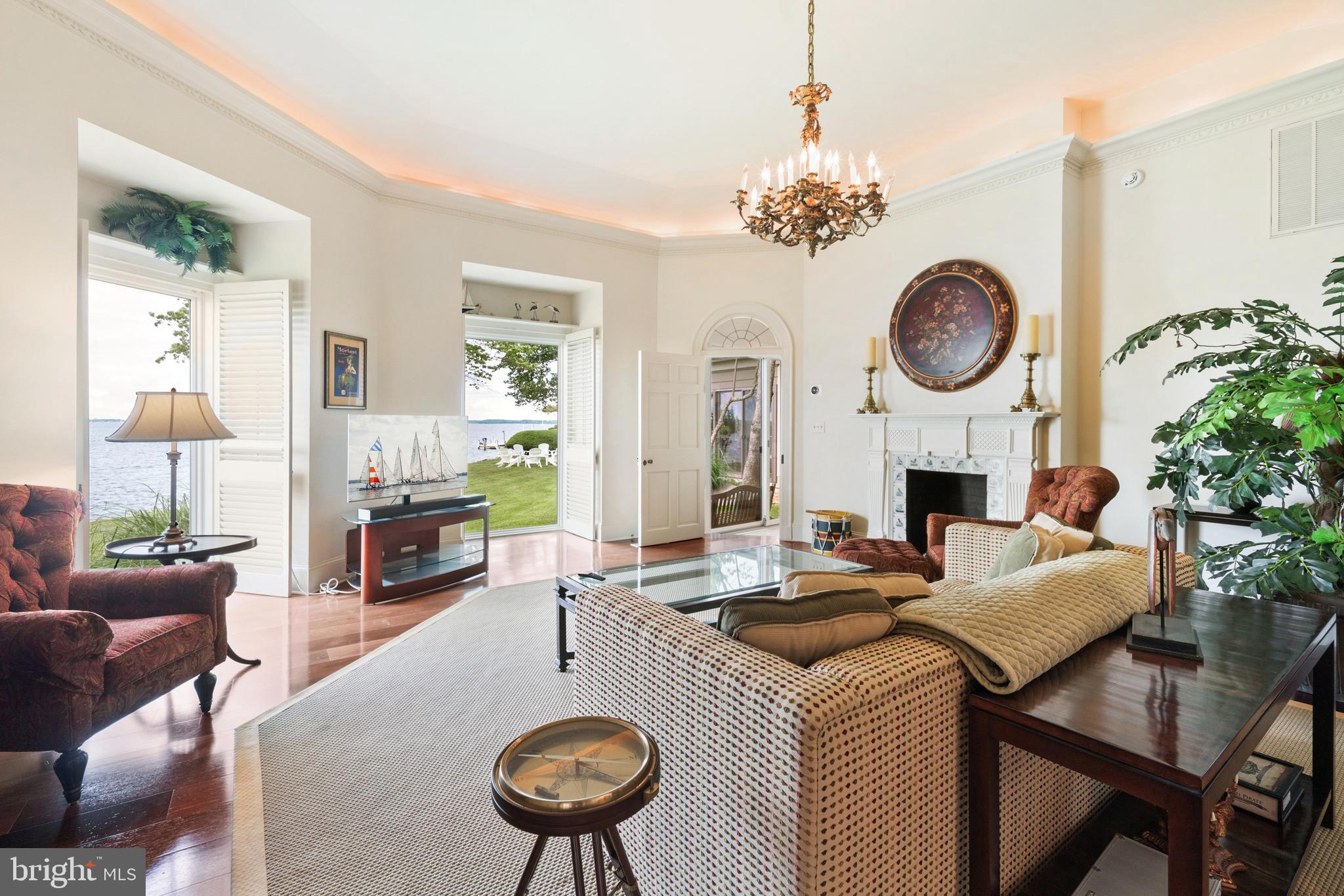 9791 Pintail Place St. Michaels, MD 21663 - Photo 35 of 80 a living room with fireplace furniture and a fireplace