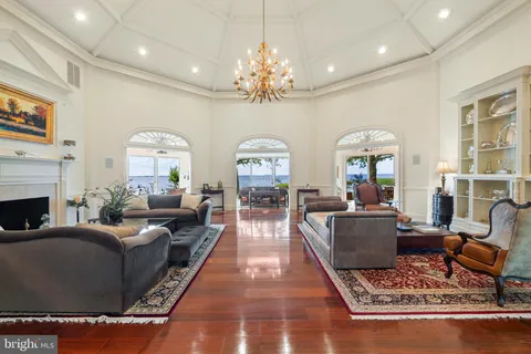 a living room with furniture and a garden