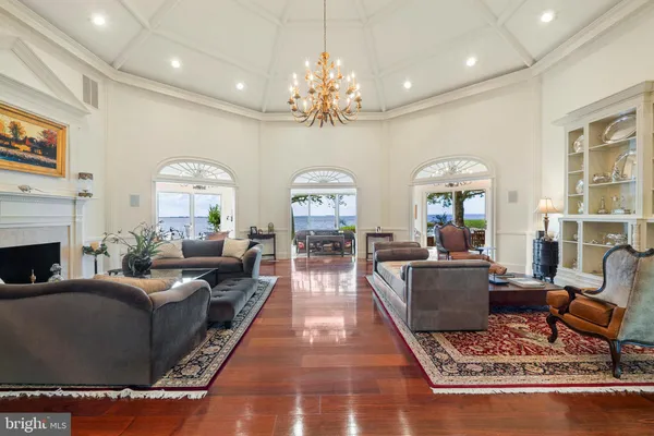 a living room with furniture and a garden