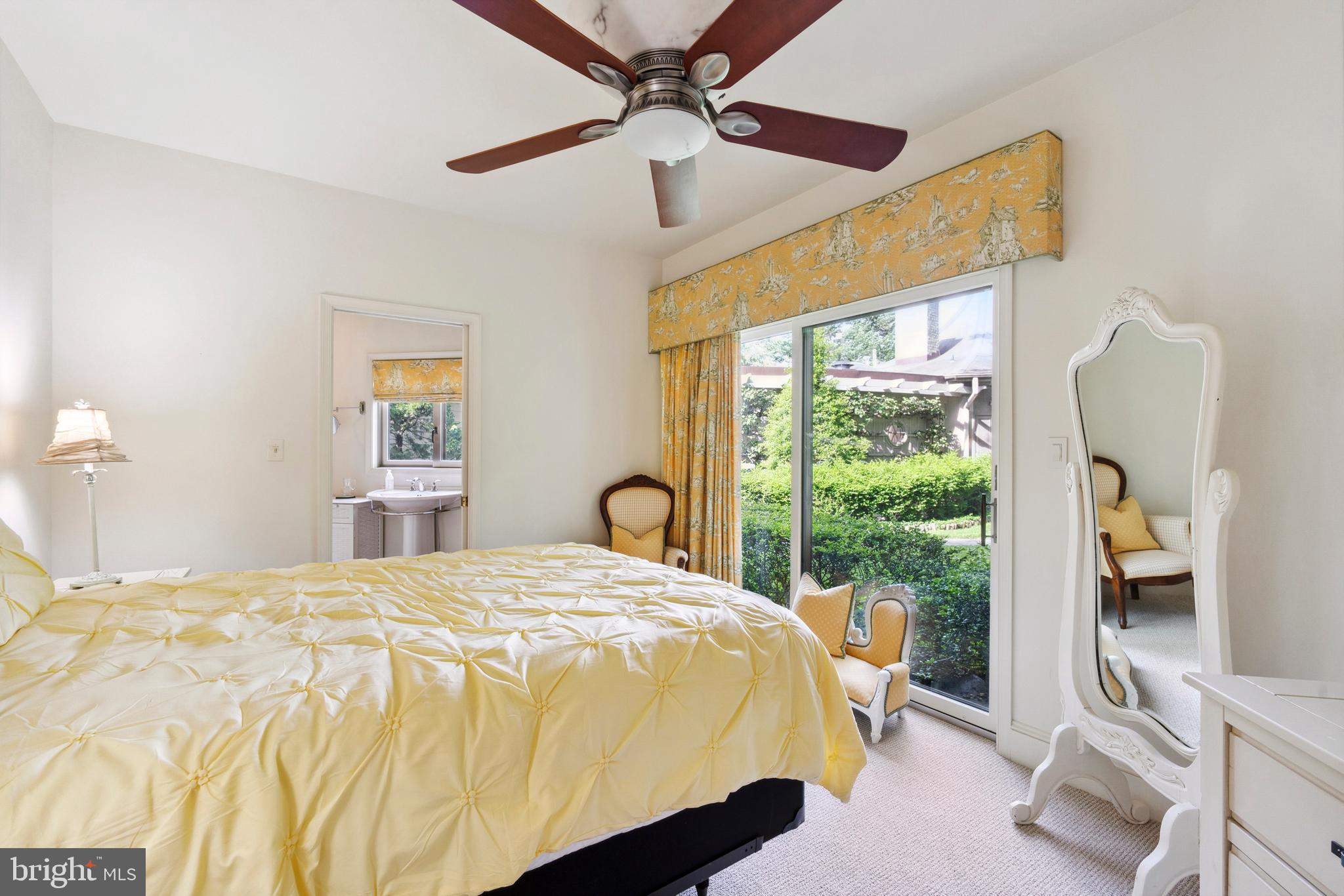 9791 Pintail Place St. Michaels, MD 21663 - Photo 51 of 80 a bedroom with a bed and a window