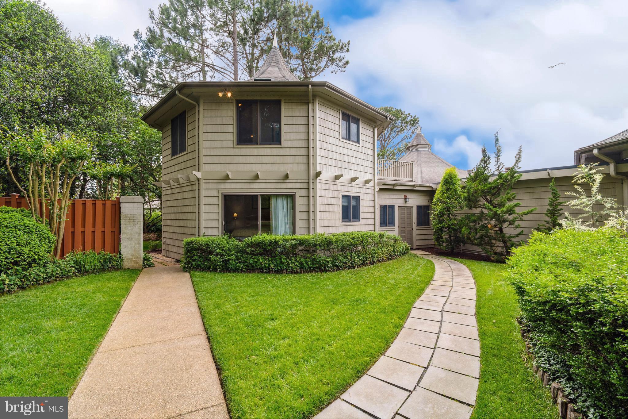 9791 Pintail Place St. Michaels, MD 21663 - Photo 58 of 80 a front view of a house with a yard