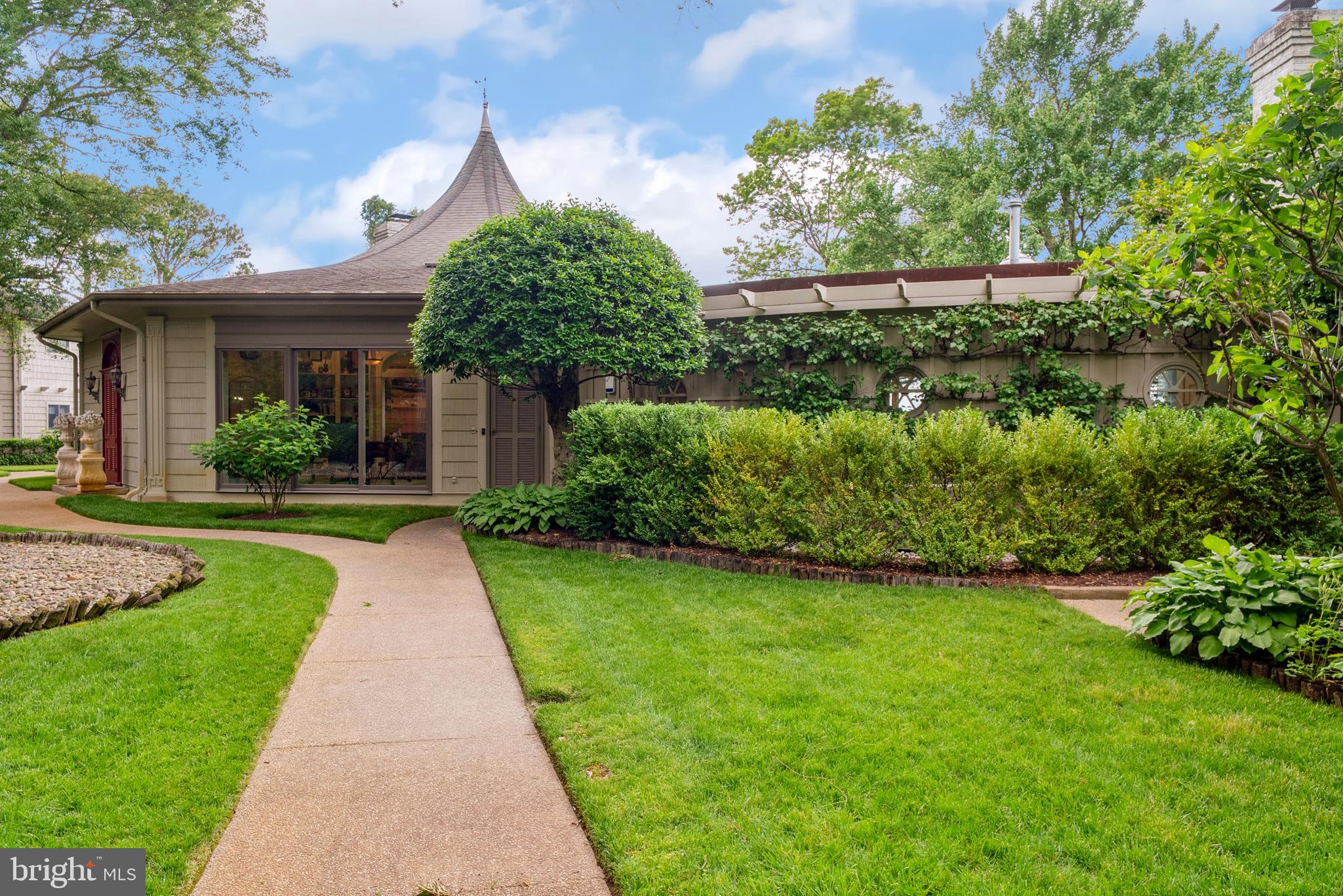 9791 Pintail Place St. Michaels, MD 21663 - Photo 68 of 80 a front view of a house with a yard