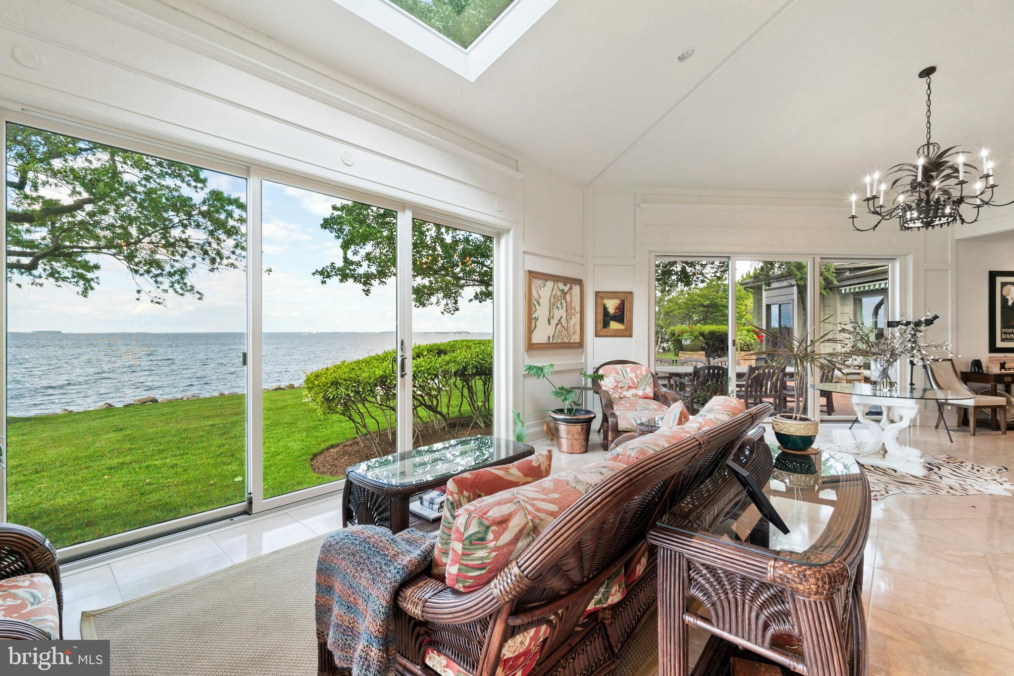 9791 Pintail Place St. Michaels, MD 21663 - Photo 10 of 80 a living room with furniture and a garden