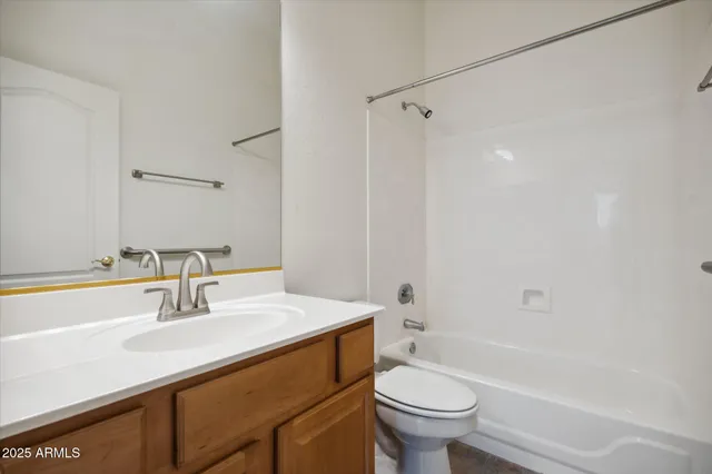 a bathroom with a sink a toilet and a bathtub