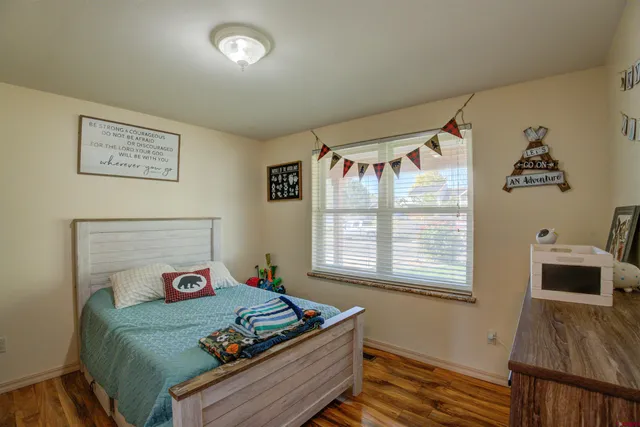 a room with a bed and a window