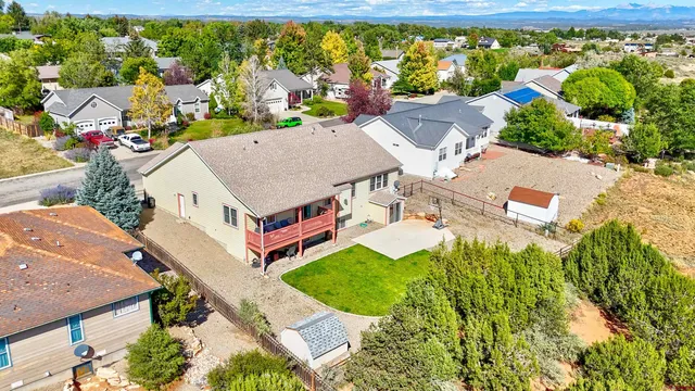 an aerial view of a house with a garden