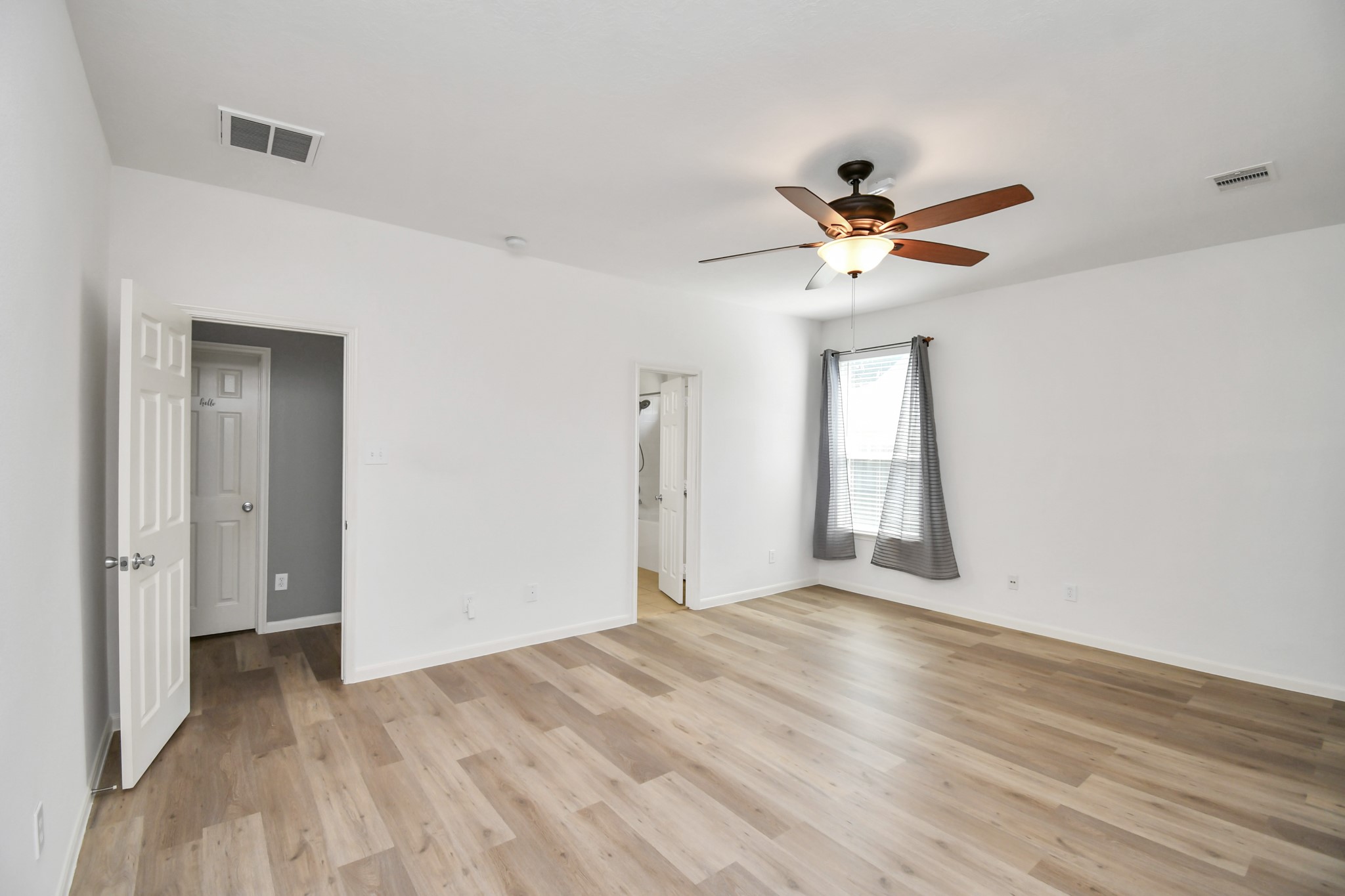 2808 Tranquility Trail Pearland, TX 77584 - Photo 11 of 30 a view of an empty room with a window