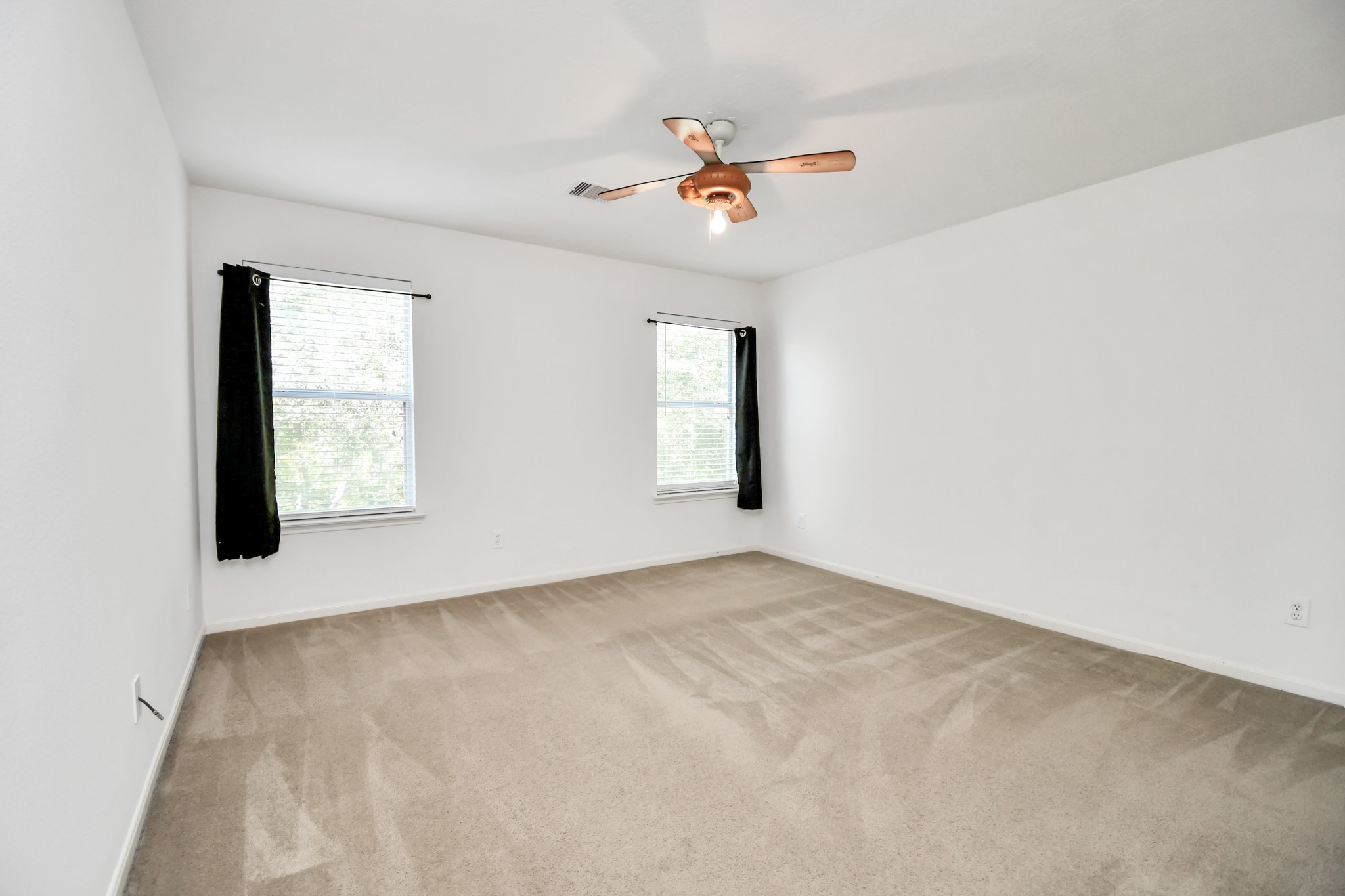 2808 Tranquility Trail Pearland, TX 77584 - Photo 21 of 30 a view of an empty room with a window