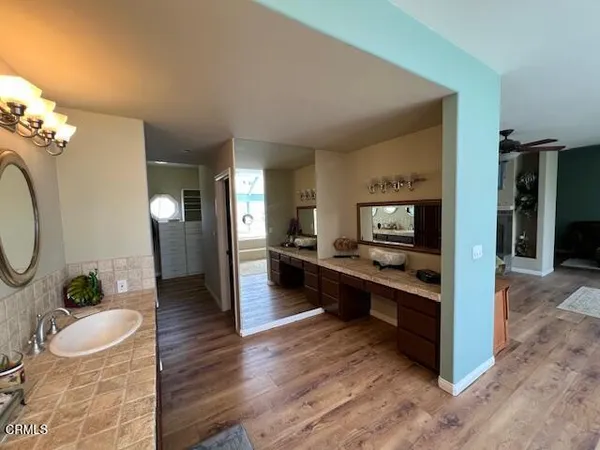 a view of living room kitchen and dining room